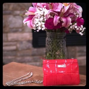 Red Kate Spade mini cross body bag